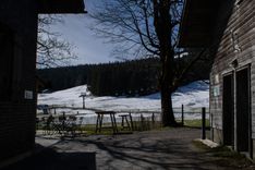 At this farm between several ski lifts at the Bödele, tourists and skiers usually stop for lunch or a quick drink during a day spent on the slopes. Without skiers and too early for hikers, it is empty.